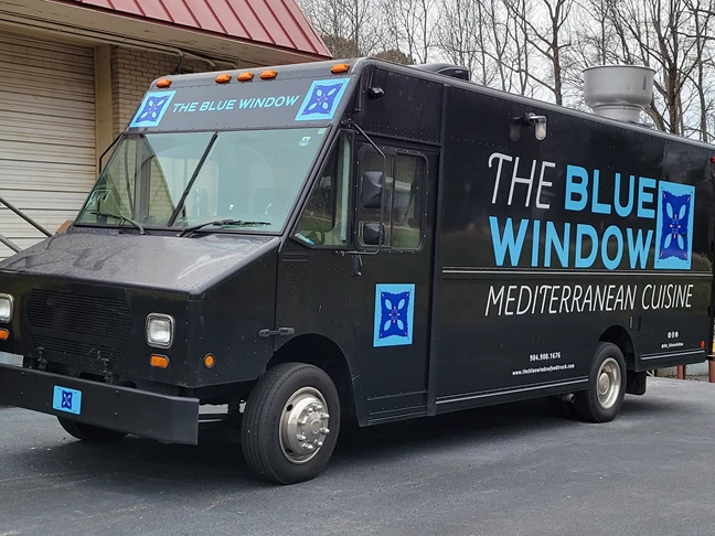 Front and Side View of Blue Window Food Truck